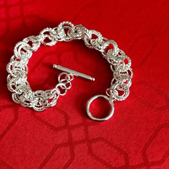 NEW 925 STERLING SILVER INTERWOVEN CIRCLES
BRACELET WITH TOGGLE CLASP  … - Picture 5 of 7